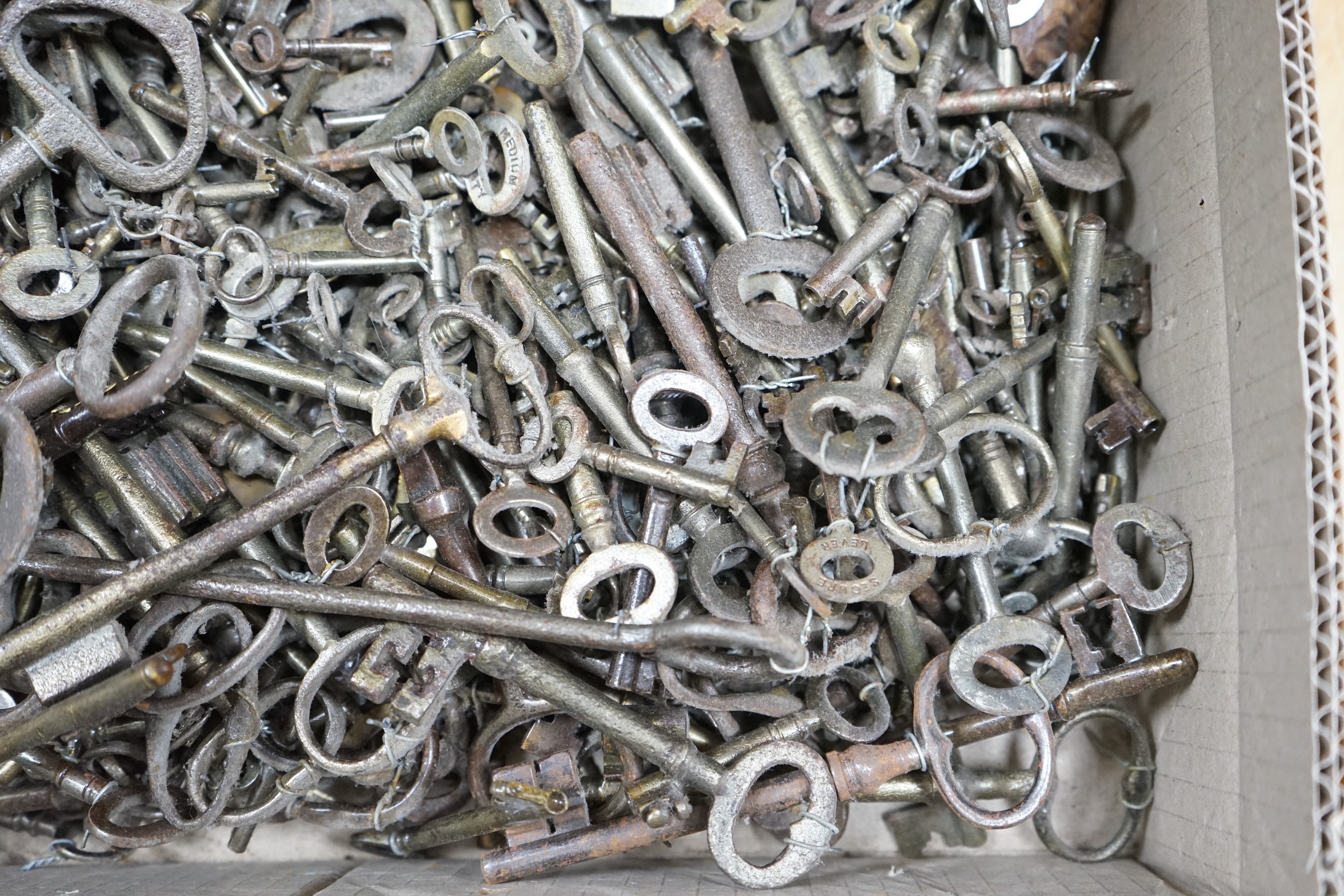 A large collection of antique keys